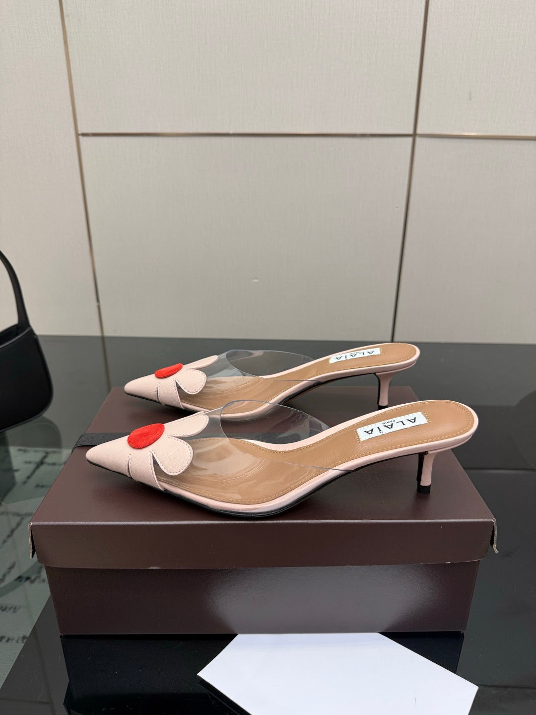 Alaia 2026 Mules 55 PVC Sheepskin 803333