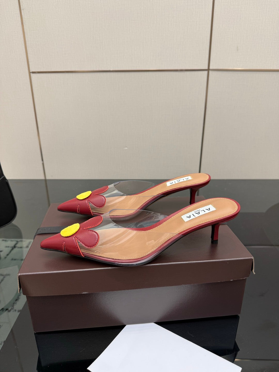 Alaia 2026 Mules 55 PVC Sheepskin 803333