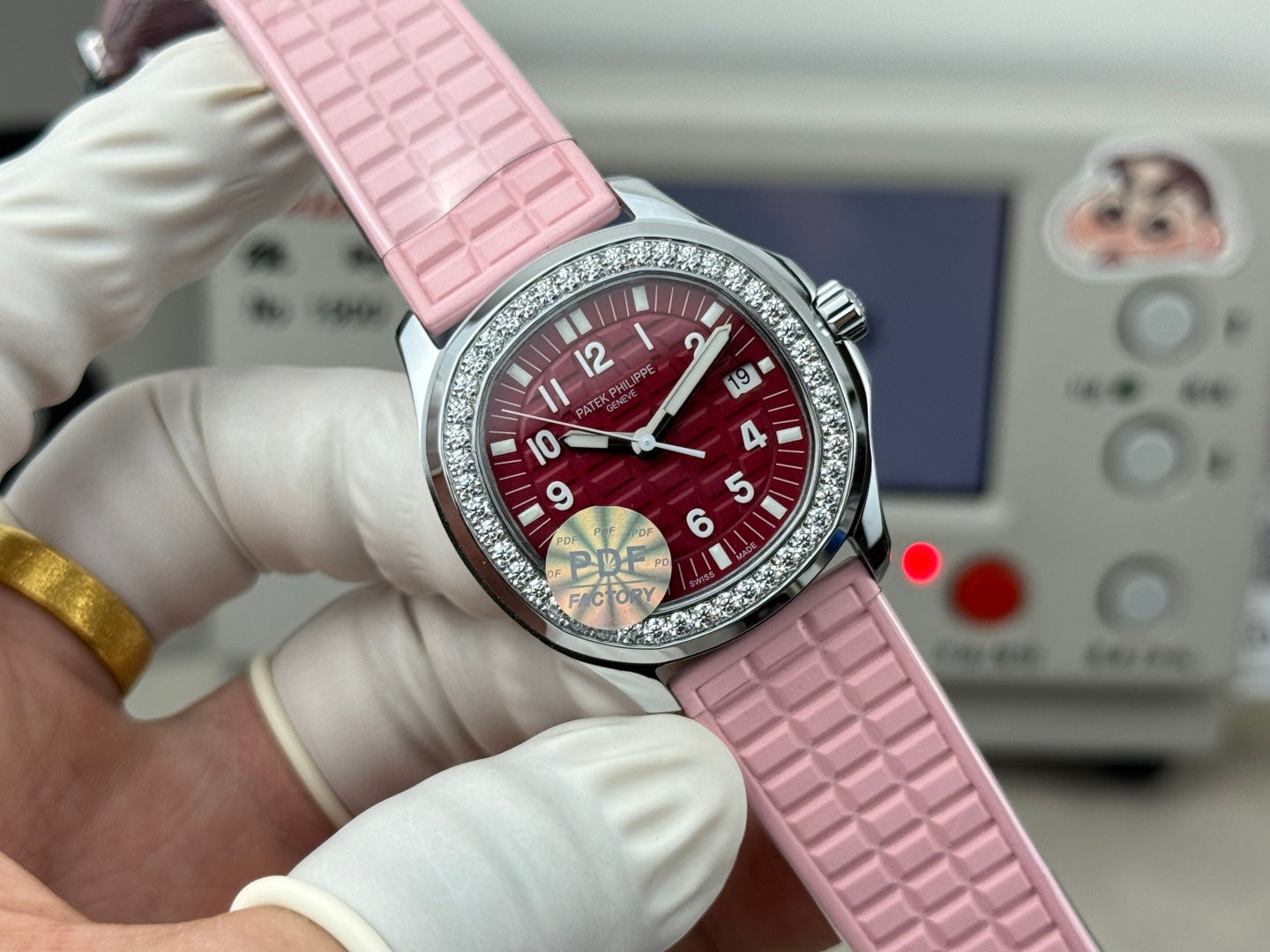 Patek Philippe Aquanaut 35.6mm Red Dial Pink Rubber Strap