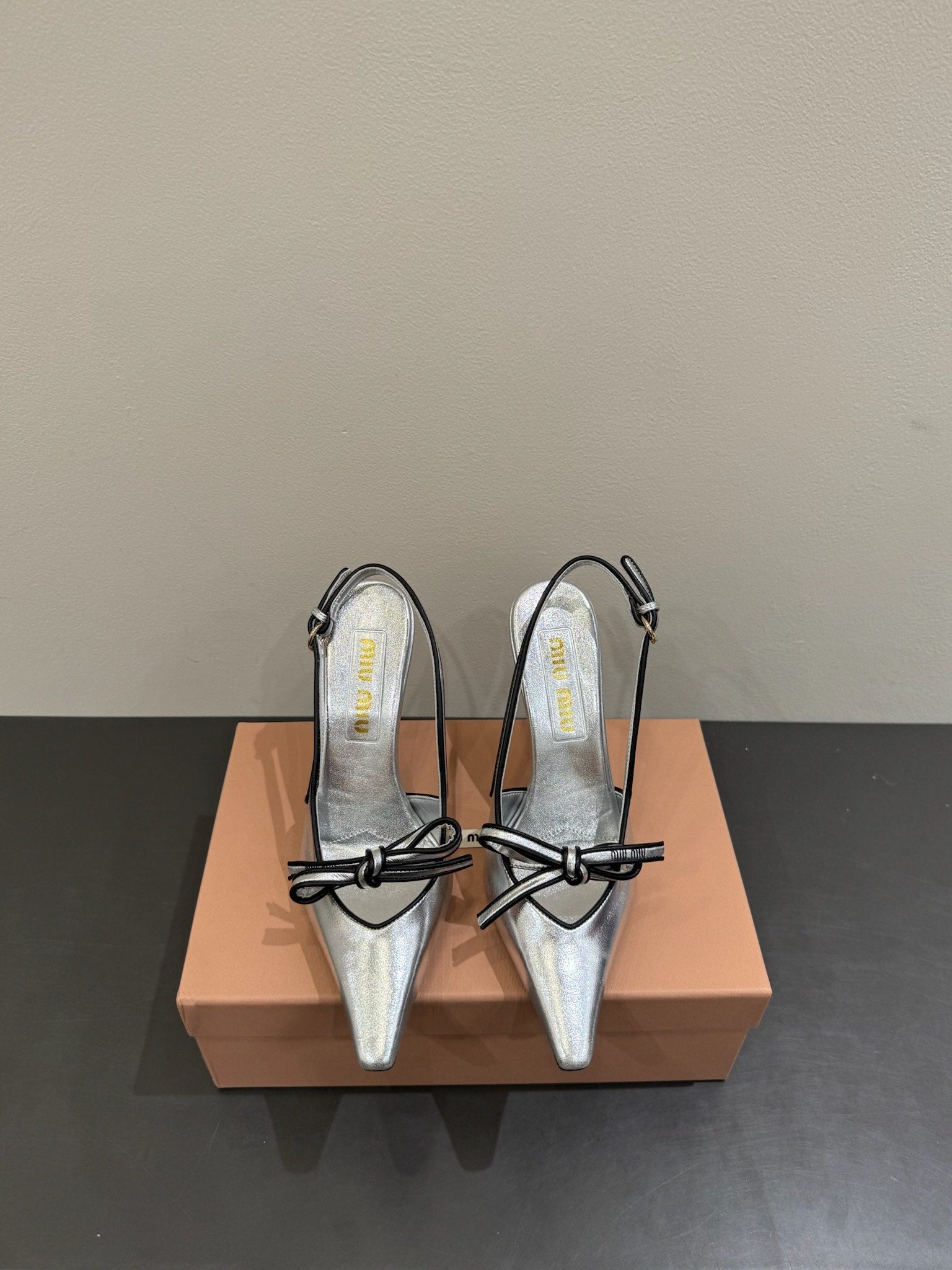 Miu slingback pump metallic sliver leather