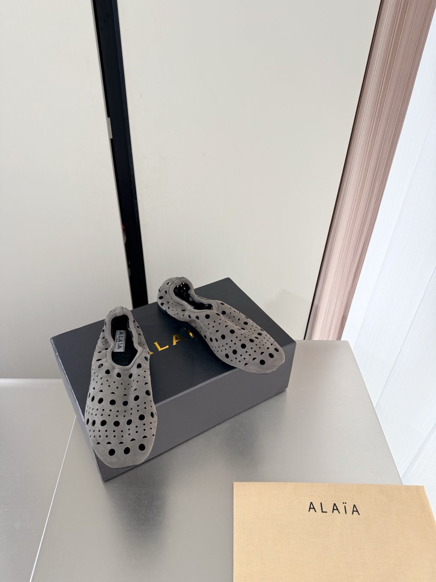 Alaia 2026 Ballerina Flats Perforated Suede 784611