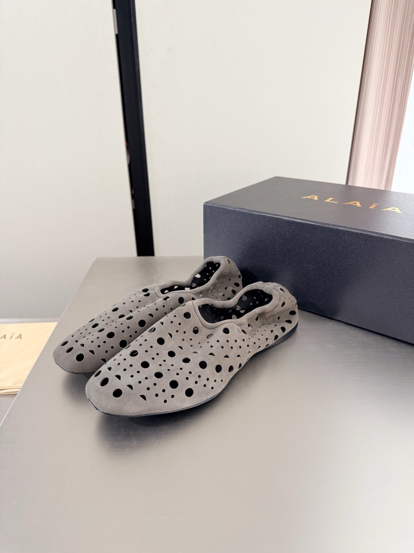 Alaia 2026 Ballerina Flats Perforated Suede 784611