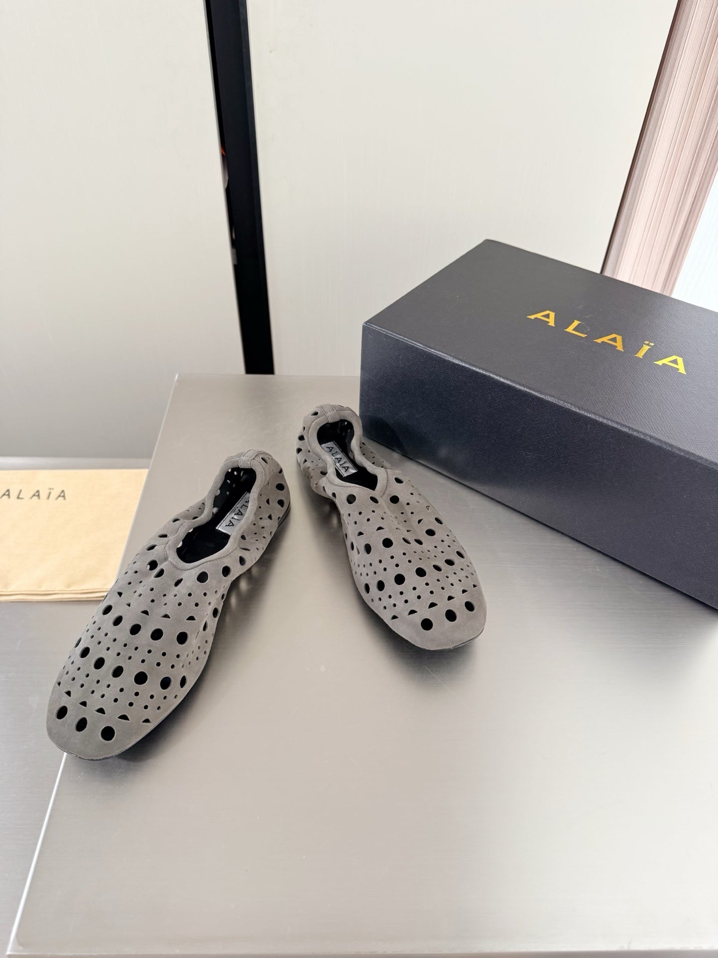 Alaia 2026 Ballerina Flats Perforated Suede 784611
