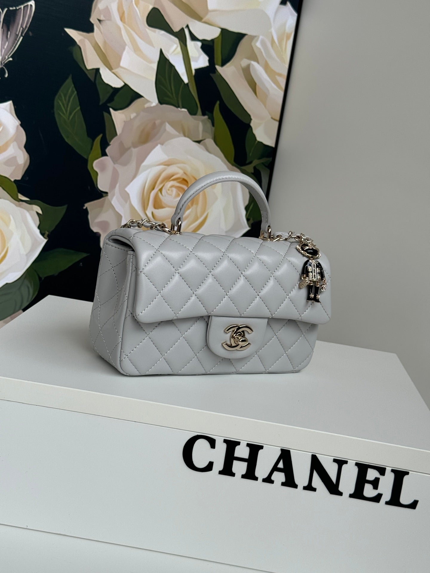24c mini flap bag 20cm with top handle grey calfskin